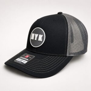 NYK Richardson 112 trucker hat black charcoal front rubber logo